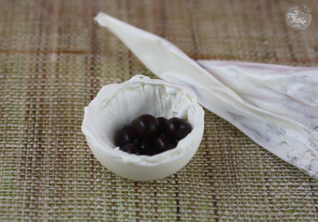 boule de noel poche pistoles